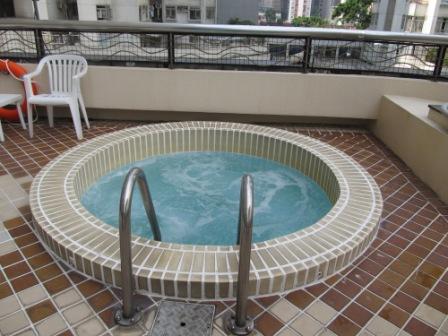 Jacuzzi next to the swimming pool in City Garden Hotel Hong Kong