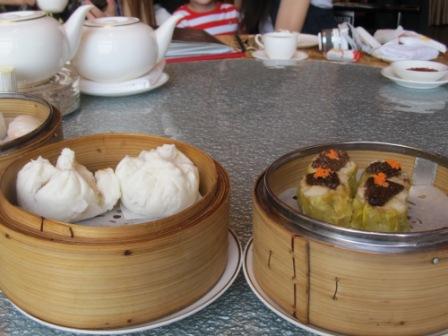(From left to right) At the corner, it is "Ha Kau".  Next to it on the right is steamed bun filled with roast pork and "Siu Mai".