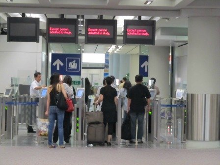 Hong Kong resident with the HKID (smart) card pass through these gates instead of going through the Hong Kong Immigration counters