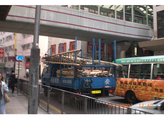 Outdoor Escalator on top of the busy traffic. You can either keep walking up the hill or down towards Central.