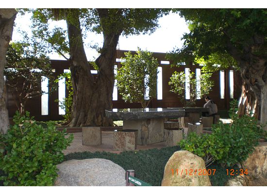 More Chinese landscaping and garden layout on the way to the Octagonal Pavilion. See the garden furniture in the middle?