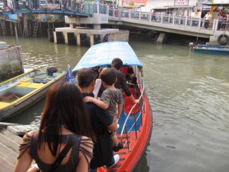 Getting on our boat in Tai O Fishing Village