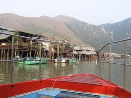 Can you see the man standing in the front porch of the house?  People live here usually rely on their boats to commute in Tai O Fishing Village