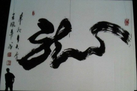 Writing Chinese calligraphy is always part of the Chinese New Year TV special programs.