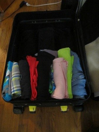 How to pack your luggage to save space?  Roll up your clothes!!!