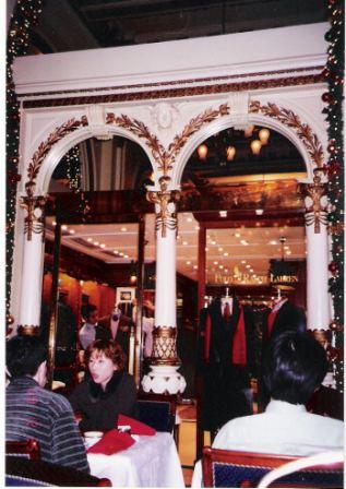 The overview of the arch where you would pass by some stores in the lobby